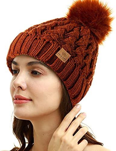 Страна една женска зимска лента со ребрести прекрстено капаче, бујно кабел, плетено помпом мека топла капа